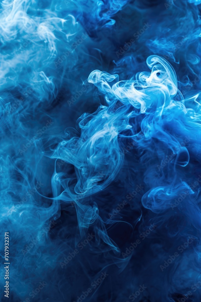 Poster blue smoke close up on a black background. perfect for adding a touch of mystery and atmosphere to a