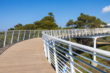 modern pedestrian bridge over the highway from the Technion University to the nature reserve.