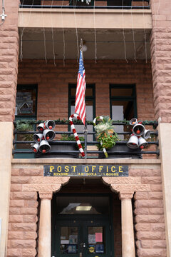 Bisbee, Arizona - December 20, 2023: Exterior of the Bisbee Arizona Post Office, decorated for Christmas
