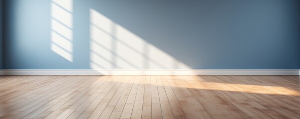 Light navy wall and wooden parquet floor, sunrays and shadows from window
