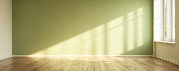 Light olive wall and wooden parquet floor, sunrays and shadows from window  - obrazy, fototapety, plakaty