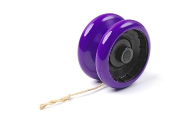 Purple Jo-Jo toy isolated on white background.