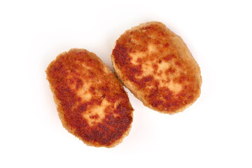 Roasted meatballs in breadcrumbs, close-up, isolated on a white background.