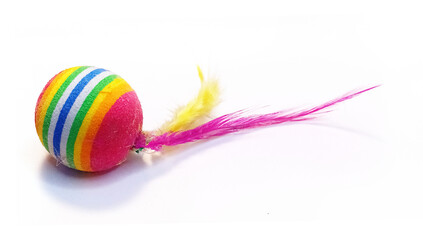 battered colourful cat toy ball with attached feathers