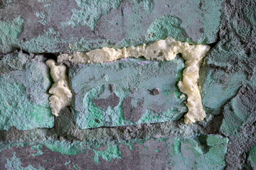 Old outer wall. Abstract wall with painted grunge background. Structure of an old wall in vintage...