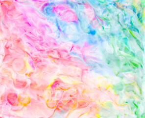 Fototapeta na wymiar Bright colorful acrylic texture. Liquid flowing acrylic on canvas. Marble texture in rainbow colors. Hand made abstract artwork with pink, blue, green and yellow colors.