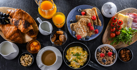 Breakfast served with coffee, eggs, cereals nd croissants