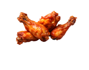 Spicy chicken wings with red sauce isolated on transparent background