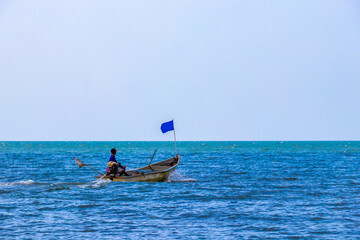 Boat Fishing boats fisher with fishing rod net Pattaya Thailand.
