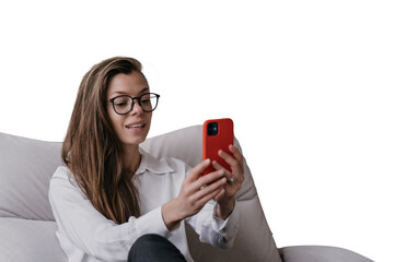 Adorable young woman in glasses talking  by phone makes video call against transparent background. Pretty student talks with parents via internet. Office manager at distant  meeting