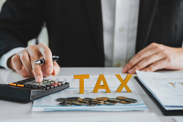 Business TAX plan development for fill in the income tax online return form for payment. Financial research,government taxes and calculation tax return concept.