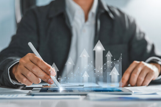 Businessman analyzes profitability of working company Planning invest indicators long-term target ,businessman calculates financial data investments.