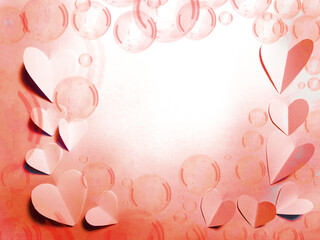 Valentine's day background with red hearts on pink and white place. Festive texture with copy space and place for text. Top view