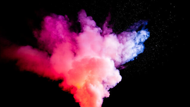 Astrazione di fumo colorato su sfondo nero.