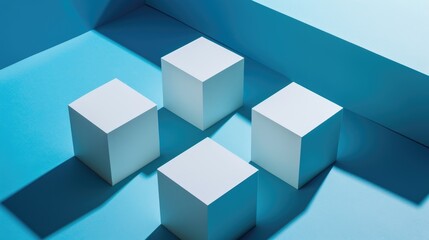 A group of four white cubes on a blue surface.