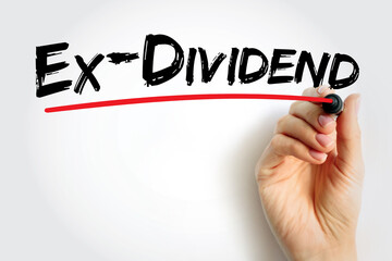 Ex-dividend - stock that is trading without the value of the next dividend payment, text concept background