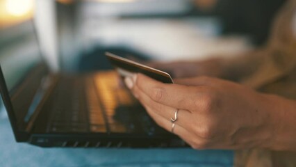 Hands, credit card and laptop for home online shopping, e commerce registration and fintech payment. Person typing on computer with internet banking and subscription on website or financial software