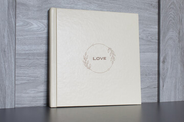 wedding or family photoalbum isolated on gray. Stylishphoto book. beige photo album with  cover ...