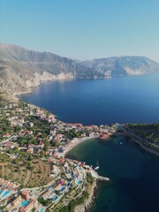 Obraz premium Drone view of Assos village and Frourio Peninsula with beautiful sea bay, Kefalonia island, Greece
