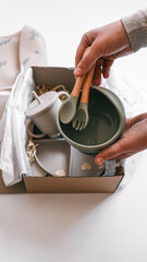 Unpacking baby products, silicone dishes for first feeding