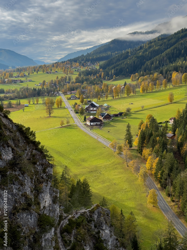 Wall mural impressive sunset at alps. wonderful picturesque landscape with colorful dramatic sky over the mount