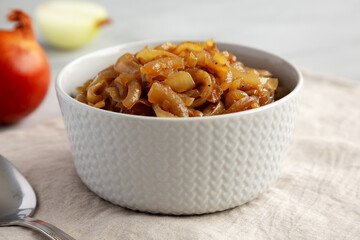 Organic Caramelized Onions in a Bowl, side view.