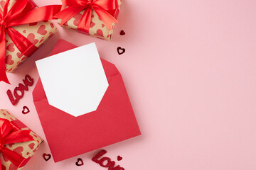 Invitation to a Valentine's day event. Top view photo of red envelope with card, present boxes, hearts on pastel pink background with promo zone