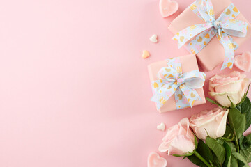 Gift ideas for International Women's Day concept. Top view composition of festive gift boxes, hearts, pink roses on pastel pink background with advert area