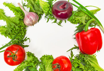 Wreath of organic colorful fresh bright vegetables on white background, top view. Copy space.