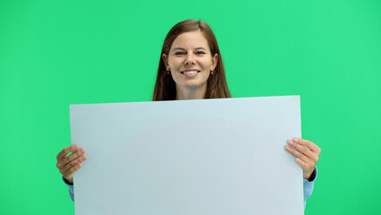 Fototapeta premium Woman, close-up, on a green background, with a white sheet
