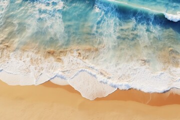 Fototapeta na wymiar Wave with sea foam on sandy beach