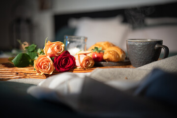 Breakfast with roses on bed. Romantic background for valentins day ore mothers day. 