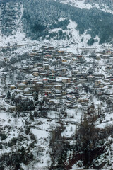 Aerial view of the city of Metsovo during winter time covered with snow