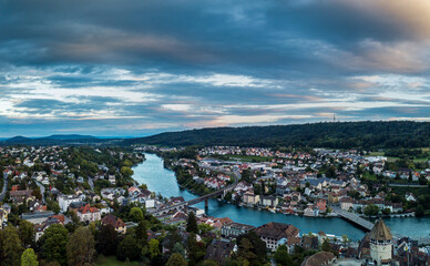 Aerial view of Swiss borough Schaffhausen and Feuerthalen on the Rhine river in the sunset hours,...