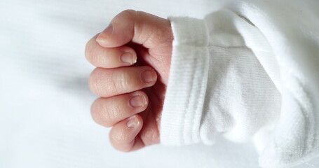 Newborn baby hand macro close-up