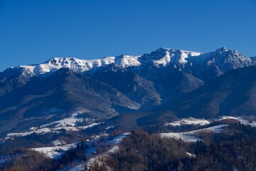 snow covered mountains, viewpoint from Magura to Bucucegi Mountains, Romania
