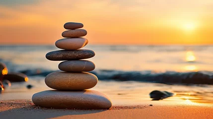 Foto op Canvas The beach is adorned with zen stones for sunrise light meditation and relaxation. © Tahir