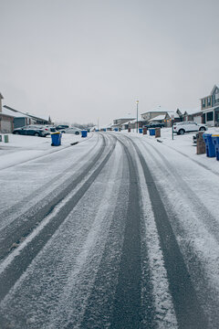 Snow road in winter with houses