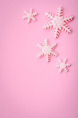 Beautiful winter snowflakes on a plain background with copy space