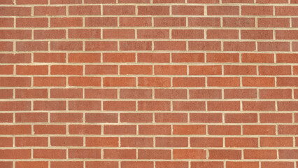 Wide angle view of a red brick wall.