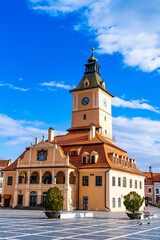 Iconic Clocktower on Grand Building in Brasov, Romania. A striking sight in Brasov, Romania, this...