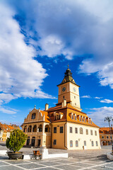 Fototapeta na wymiar Brasov Clock Tower, Iconic Tall Building With Clock in Transylvania, Romania.