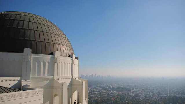 Shot of element Observatory on Mount Hollywood on summer day with downtown Los Angeles. 