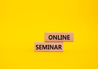 Online Seminar symbol. Concept word Online Seminar on wooden blocks. Beautiful yellow background. Business and Online Seminar concept. Copy space