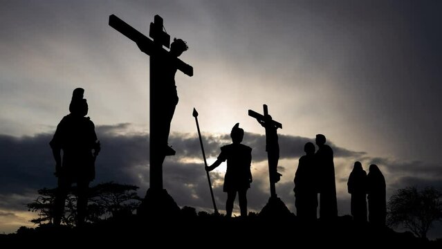 Crucifixion, religion and christianity concept,  Time Lapse at Sunrise with Fast Clouds and Dark Silhouette of  Biblical scene