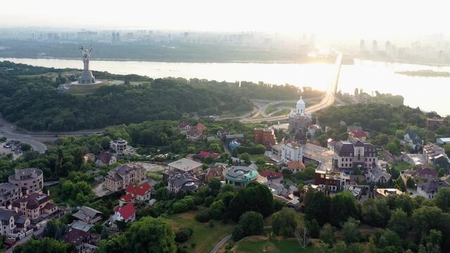 Panoramic view of Kyiv city and Dnipro river with Paton bridge and Motherland Monument in the morning. Panorama of Kiev, capital of Ukraine.