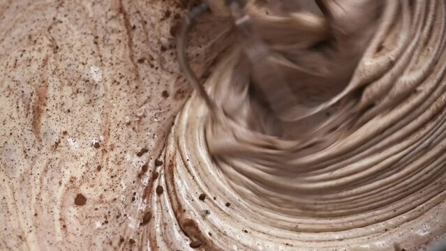 Pie dough kneading adding cocoa using automatic mixer