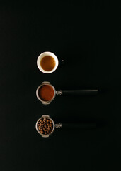 A top-down composition features coffee in various stages: beans, ground and espresso shot, all against a black background.