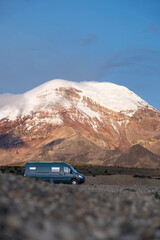 Blue hour vanlife with a volcano behind