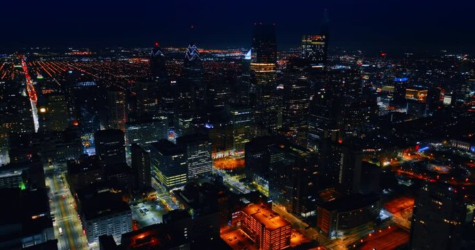 Scenic view on the American metropolis with mighty skyscrapers. Night panorama of Philadelphia, Pennsylvania, USA.